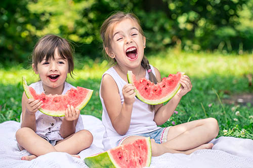 two girls smiling